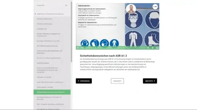 Aufnahme aus der Allgemeinen Sicherheitsunterweisung: Referent erklärt neben der Lerntafel